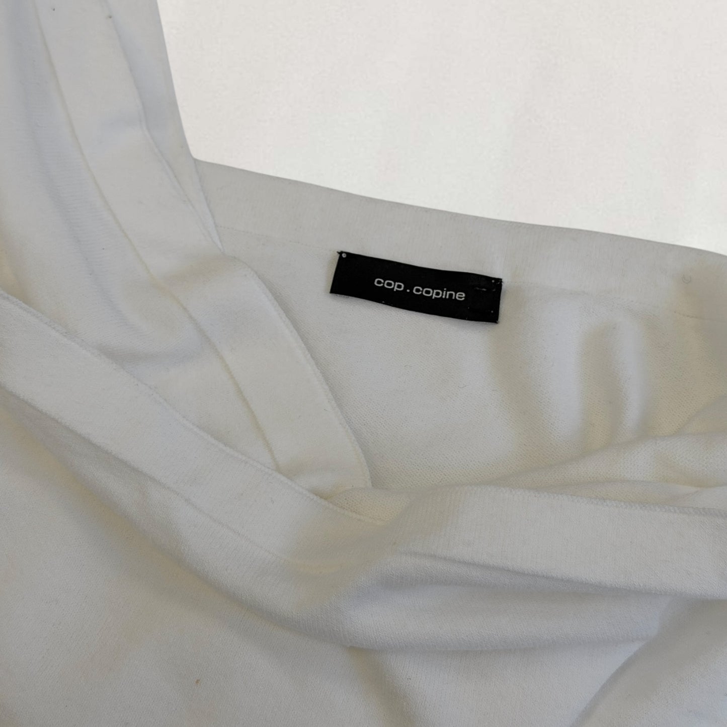 Cop Copine cross over top