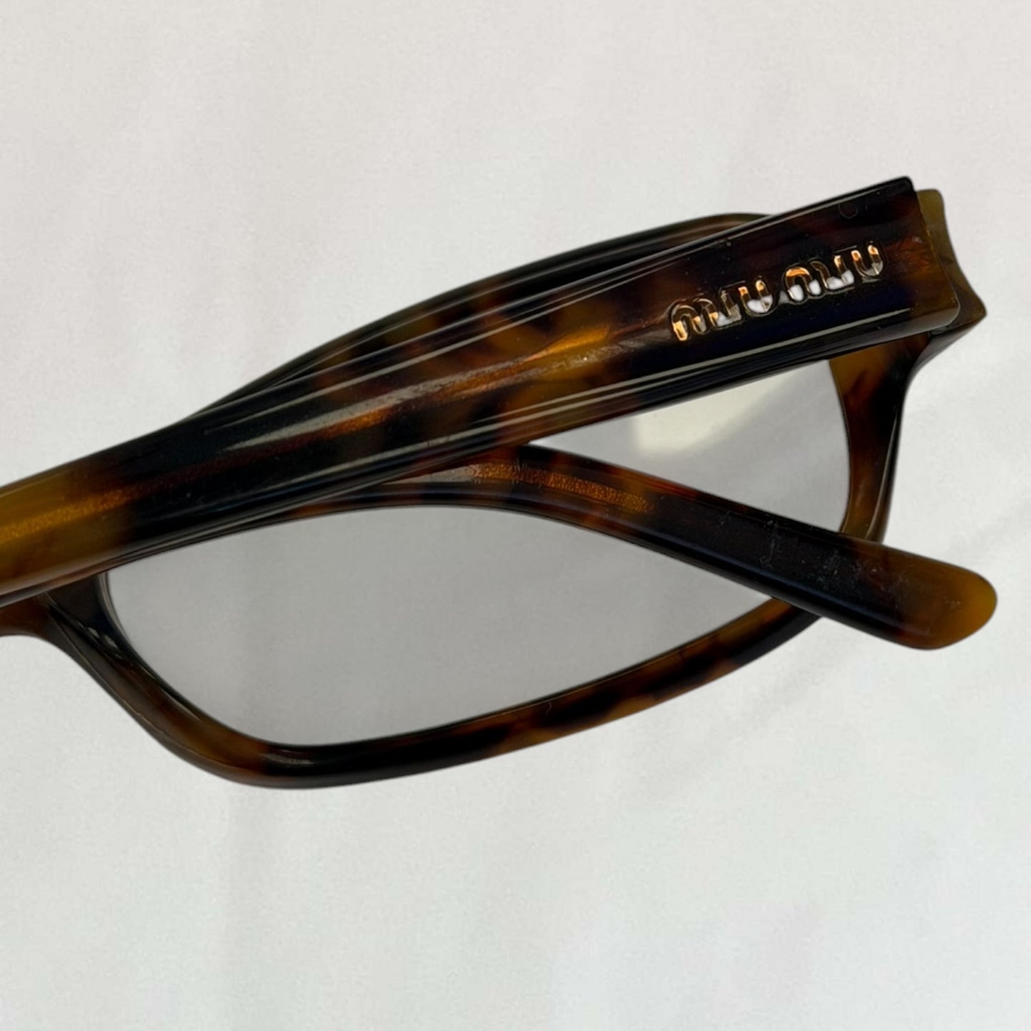 Miu Miu tortoiseshell glasses